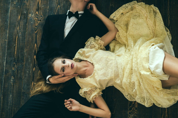 Fashion couple together. Fashion man and woman are dating. Date of beautiful couple. Elegant couple in love. Valentines day. Love. Doing everything together. Never boring. Lovely evening - Фото, изображение