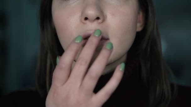 herpes on the lips, part of a womans face with finger on lips with herpes, beauty concept - Materiał filmowy, wideo