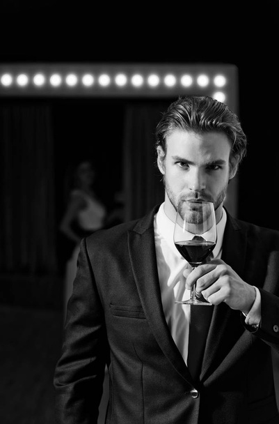 young man or businessman hold wine glass, meeting and relax - Foto, imagen