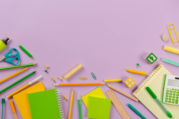 Top view of school and office supplies on colorful background - Foto, immagini