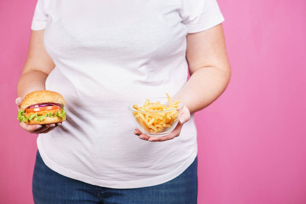 weight loss, unhealthy food. woman with fast food - Photo, Image