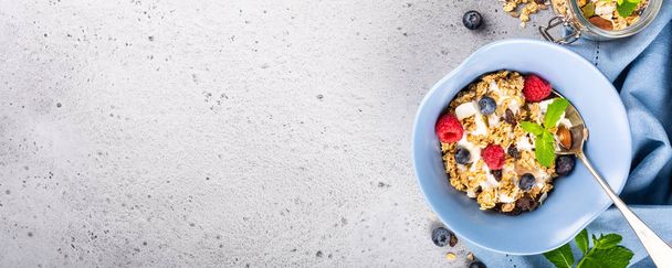 Oat granola with berries and yoghurt - Photo, Image