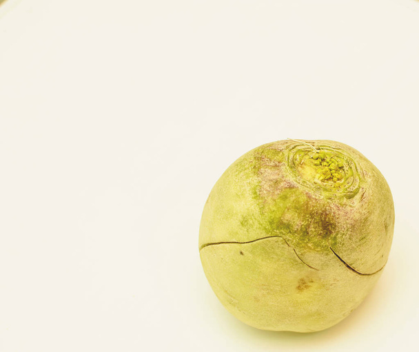 Green ripe radish on a white background - Valokuva, kuva