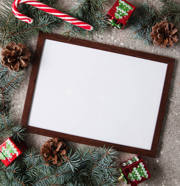 Wooden frame with christmas decorations. - Foto, Bild