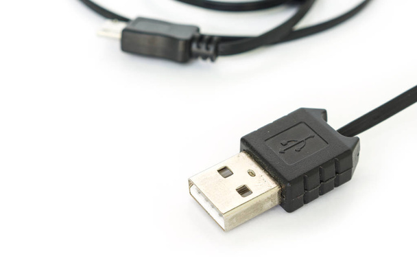Podłącz USB ładowarka czarny technologia telefon na białym tle - Zdjęcie, obraz