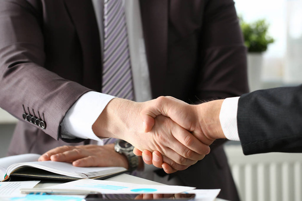 Man in suit shake hand as hello in office - Φωτογραφία, εικόνα