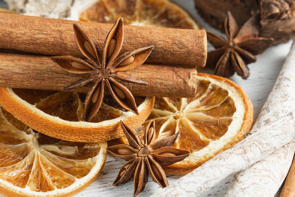 Star anise and cinnamon on rustic background. - Photo, image