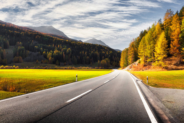 Amazing view of alpine road, orange larch forest and high mountains - Φωτογραφία, εικόνα