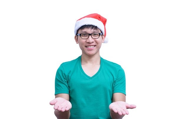 Asiatischer gutaussehender Mann mit grünem Hemd und Brille ignoriert Verantwortung isoliert auf weißem Hintergrund mit Kopierraum. - Foto, Bild
