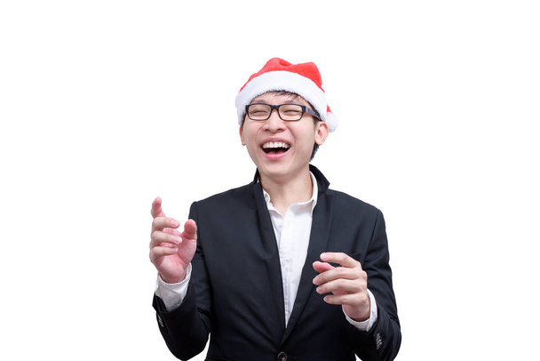 Hombre de negocios tiene feliz y riendo con los temas del festival de Navidad aislados sobre fondo blanco
. - Foto, Imagen