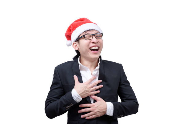 Liikemies on onnellinen ja nauraa joulufestivaali teemoja eristetty valkoisella taustalla
. - Valokuva, kuva