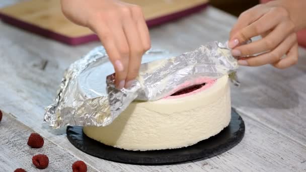 Making raspberry cream mousse cake. Raspberry cake.Cooking process. - Footage, Video