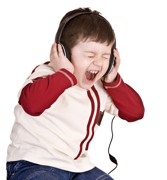 Niño en auriculares escuchar música
. - Foto, imagen