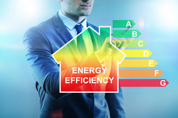 Üzletember az energiahatékonyság koncepciójában - Fotó, kép