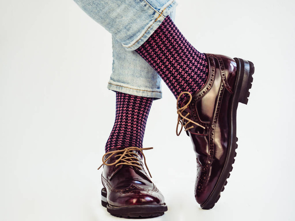 Mens legs, stylish shoes and funny socks. - Photo, image