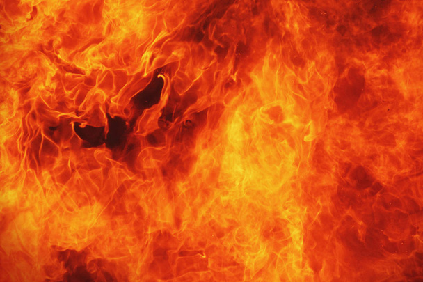 υπόβαθρο της φωτιάς ως σύμβολο της κόλασης και της αιώνιας μαρτύριο - Φωτογραφία, εικόνα