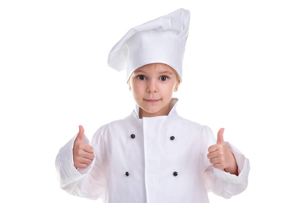 Happy satisfied girl chef white uniform isolated on white background. Showing pointing fingers up. Landscape image - Foto, Imagem