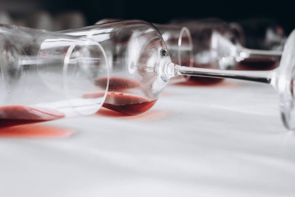Glasses of red  wine  on white and dark background,  copy space.  Wine degustation concept - 写真・画像