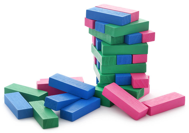 Jenga building of colorful wooden blocks - Photo, Image