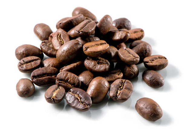 roasted coffee beans heap close-up on white background  - Foto, Imagen