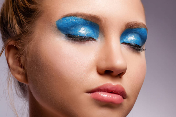 Beautiful model with a bright spring make-up close up - Photo, Image