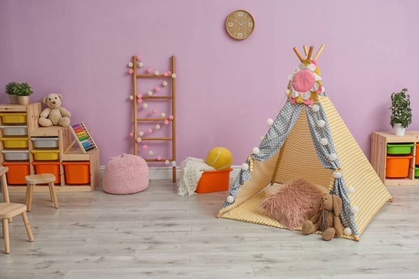 Modern nursery room interior with play tent for kids - Foto, imagen
