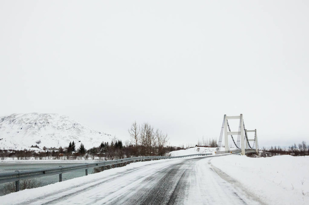 Beautiful and dangerous driving road in winter snow Iceland - Fotó, kép
