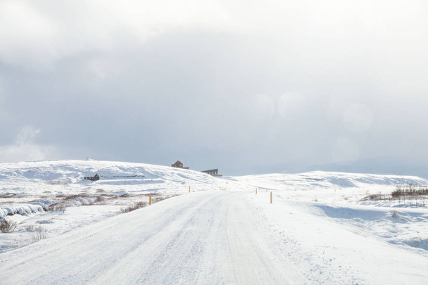 Beautiful and dangerous driving road in winter snow Iceland - Fotó, kép
