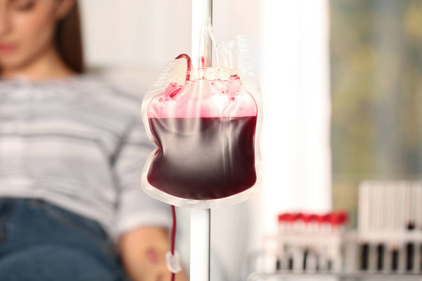 Blood donation pack hanging on dropper stand at hospital - 写真・画像