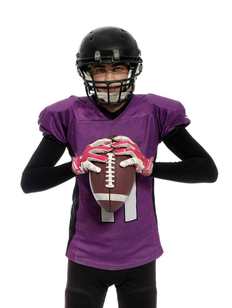 American football player with ball on white background - Photo, image