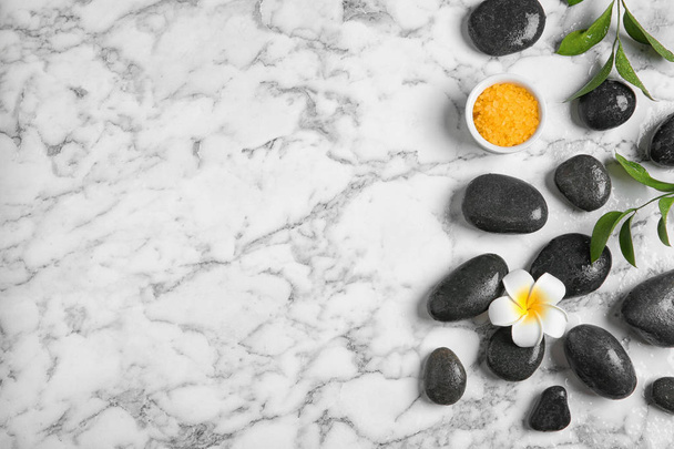 Flat lay composition with spa stones and space for text on marble background - Foto, Imagem
