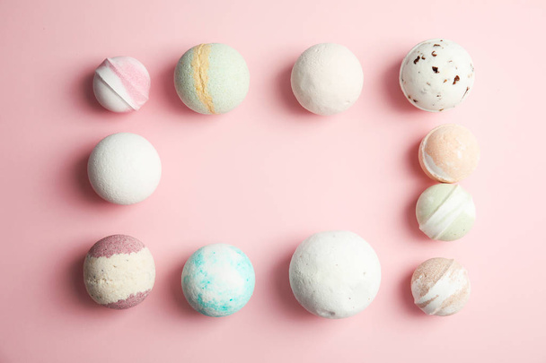 Flat lay composition with bath bombs and space for text on color background - Photo, Image