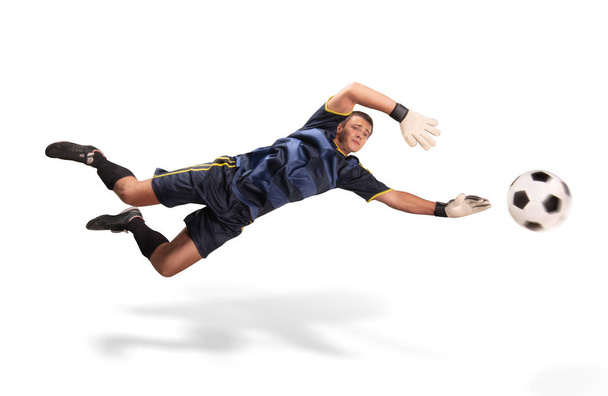 goalkeeper flying for the ball isolated on white - Фото, зображення