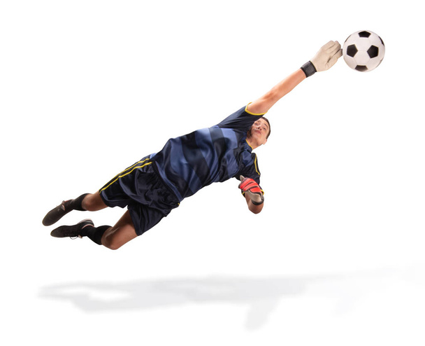 goalkeeper flying for the ball isolated on white - Photo, Image