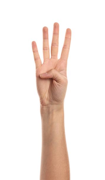 Mano femenina mostrando cuatro dedos sobre fondo blanco
 - Foto, imagen
