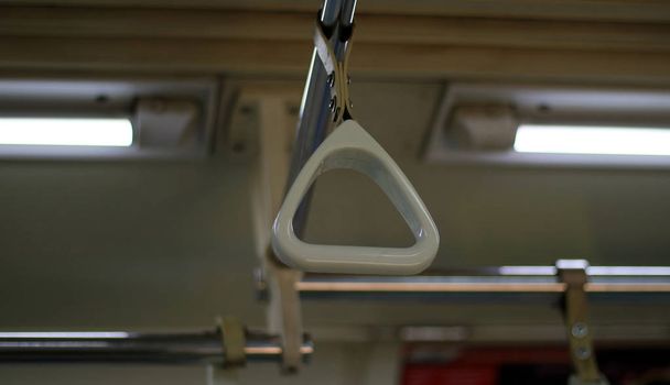Πλαστικό χέρι κιγκλίδωμα στο κατόχων διαρκούς εισιτήριου γραμμών σε Τζακάρτα. - Φωτογραφία, εικόνα