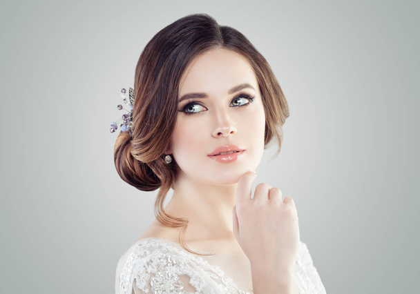 Young perfect woman with makeup, updo hair and hairdeco - Fotoğraf, Görsel