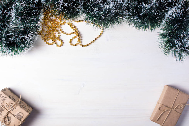 Christmas presents at white wooden table - Fotografie, Obrázek
