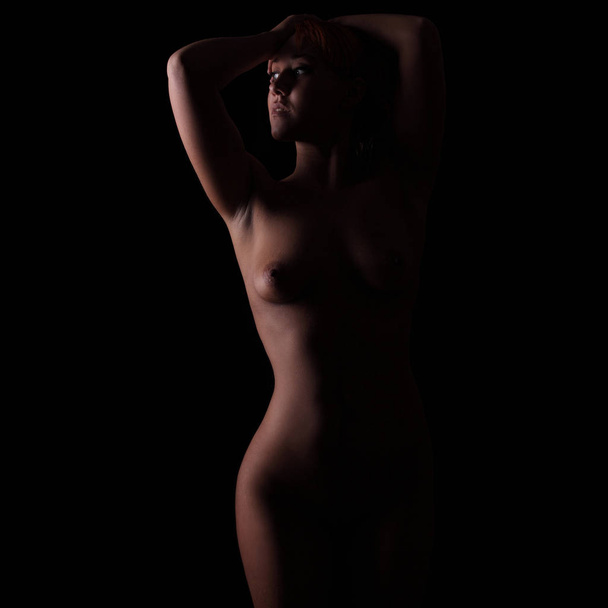 young sexy naked girl on black background - Photo, Image