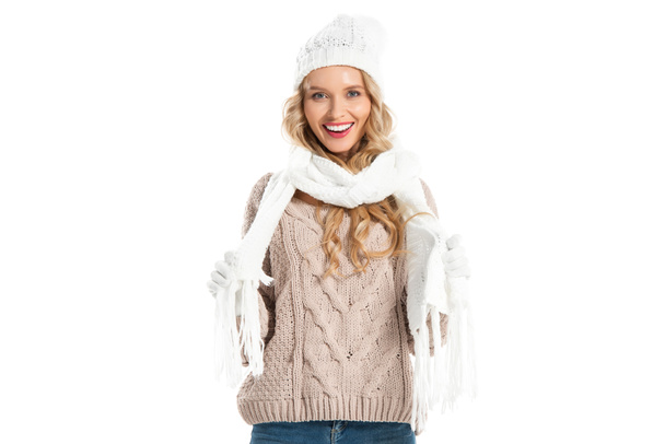 Smiling girl in warm clothes looking at camera isolated on white - Photo, Image