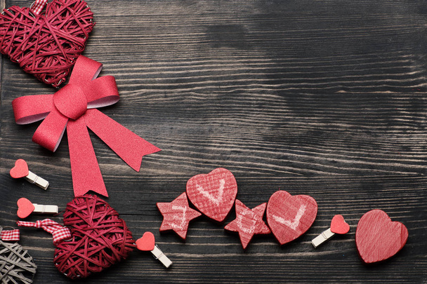 Love and Valentines day concept. Hearts, bow, stars and peg - Photo, Image