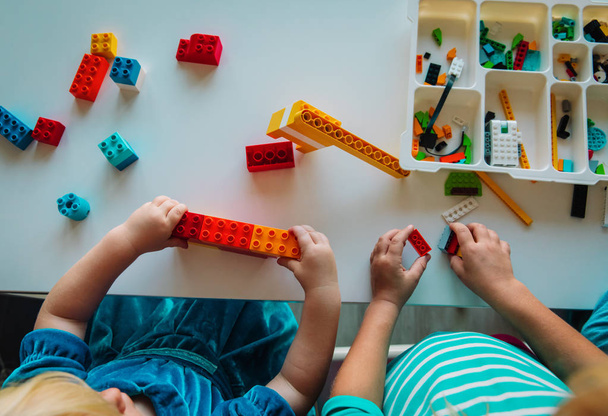 kids play with plastic blocks, learning concept - Photo, Image