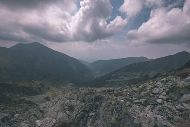 beautiful mountain panorama from top of Banikov peak in Slovakian Tatra mountains with rocky landscape and storm cloudy sky - Fotografie, Obrázek