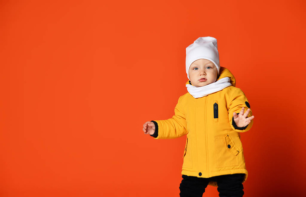 Children in winter clothes. Kids in down jackets. Fashion child - Foto, Imagen