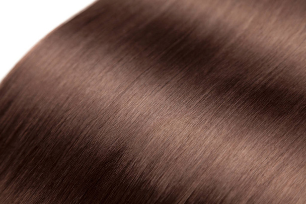 Closeup on luxurious straight glossy brown hair - Fotoğraf, Görsel