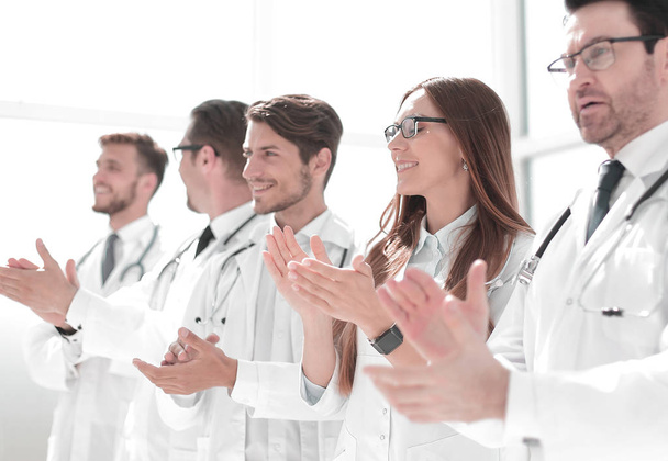 group of successful doctors applauds - Foto, immagini