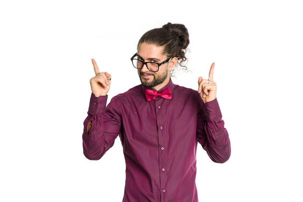 Male hipster in glasses shows fingers up. Man on the white background. - Fotografie, Obrázek