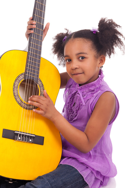 Young girl with guitar on white background - Фото, зображення