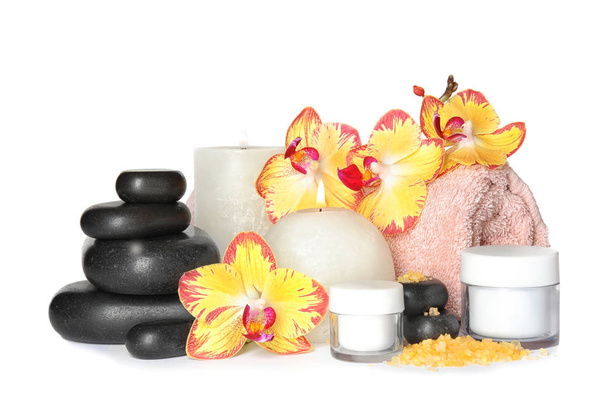 Composition with spa stones and candles on white background - Photo, Image