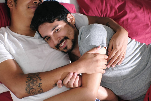 Homosexual Couple Hugging and Relaxing In Bed - Photo, Image